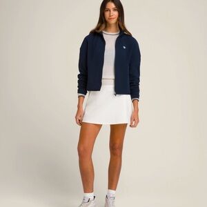 Wilson play on skirt. Size M. Cream/white in color.